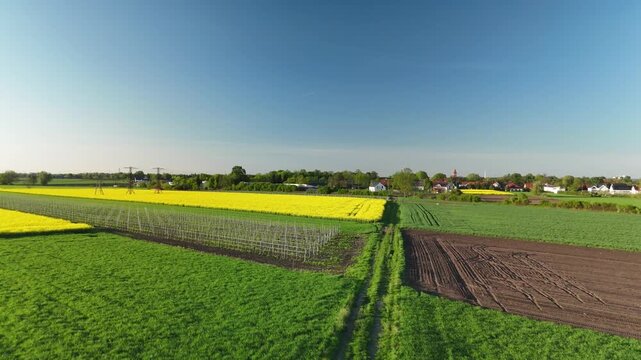 Aerial view of colorful agricultural fields and rural countryside landscape in Poland
