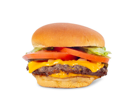 Cheeseburger with lettuce, tomato and onion isolated on white background