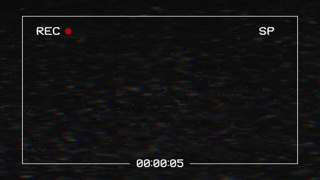 Camera recording screen overlay with vintage vhs glitch. Perfect for retro-themed projects, found footage aesthetics, or nostalgic video overlays. 4k video
