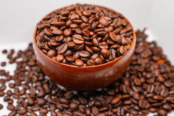 Fototapeta premium coffee beans in a cup