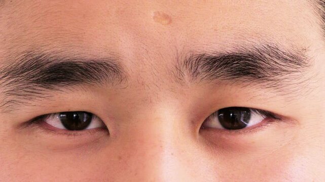Health, face and man with vision in closeup for optical assessment, eyesight test or wellness. Optometry, healthcare and person with eye examination for cornea disease, ocular pressure and cataracts