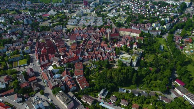 Aerial panoramic view above the old town around the city Leonberg on a sunny spring day. 