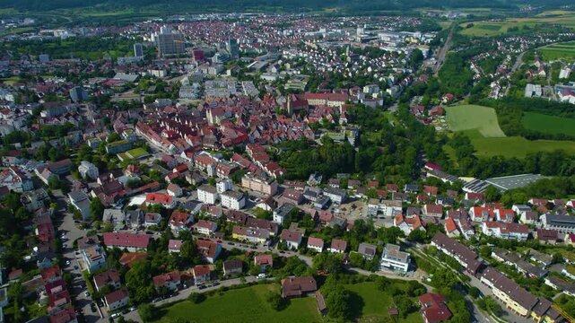Aerial panoramic view above the old town around the city Leonberg on a sunny spring day. 
