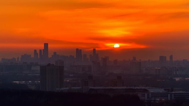 Evening City Glow. Cityscape During Sunset With Radiant Orange Illumination And Tranquil Atmosphere