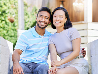 Fototapeta premium Happy, asian couple and portrait with partner in garden for love, outdoor romance or date together. Man, woman or smile with hug or embrace for comfort, holiday or weekend in backyard, house or home