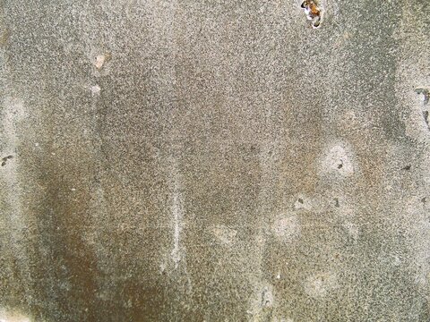 Texture of destroyed APC armor with shell hits and shrapnel holes, damaged armored vehicle hull from modern military conflict, rusty steel surface of knocked out armored personnel carrier, war destruc