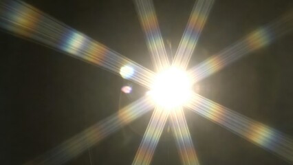 Obraz premium Point light producing starburst rays in dark interior
