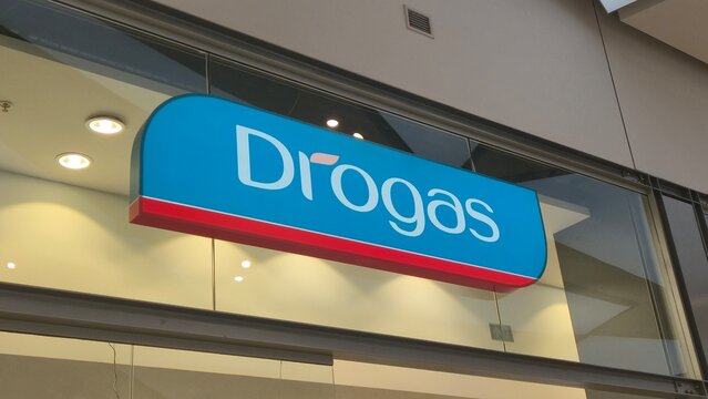 Vilnius Lithuania 09.05.2026 Drogas beauty and cosmetics store illuminated logo in modern shopping mall personal care retail brand storefront with contemporary commercial interior design