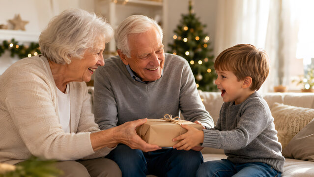 Excited Child Receiving Christmas Gift from Grandparents