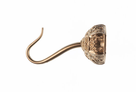 Golden pirate hook isolated on white background