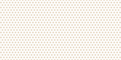 Seamless pattern with beige polka dot background. © arina