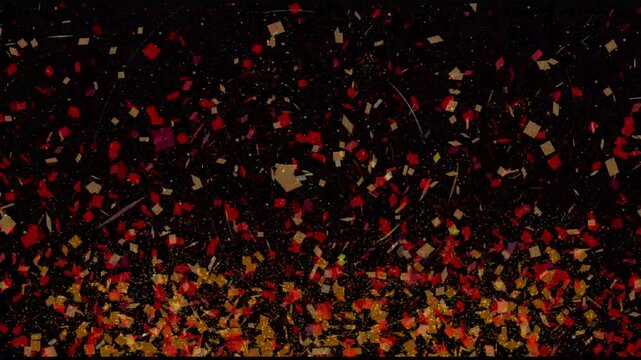 Colorful confetti explodes on a black background. Luma matte included Vibrant multi-color square   transition with slow motion explosion effect festive 4k loop background for holiday  celebrations.
