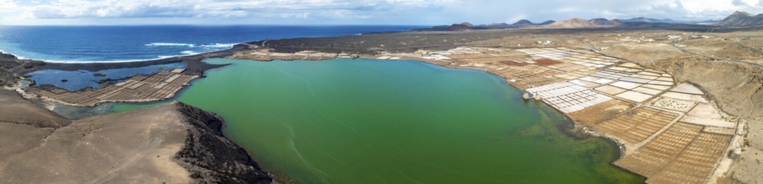 Salt mining plant, Salinas de Janubio with green Laguna de Janubio, near Yaiza, aerial view, Lanzarote, Canary Islands, Spain