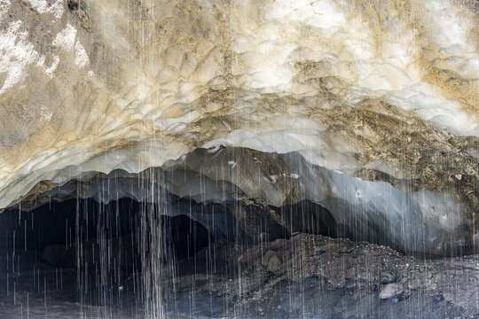 Meltwater at a glacier cave, underground glacier stream, Castner Glacier, Delta Range, Alaska Range, Richardson Highway, Alaska, USA