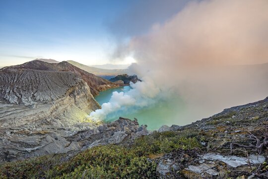 Volcano Kawah Ijen, volcanic crater with crater lake and steaming vents, morning light, Banyuwangi, Sempol, Jawa Timur, Indonesia