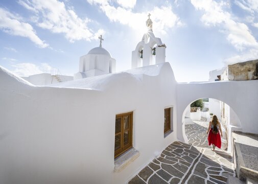 Young woman at a church, Agia Anna, Greek Orthodox Church, Marpissa, Paros, Cyclades, Greece