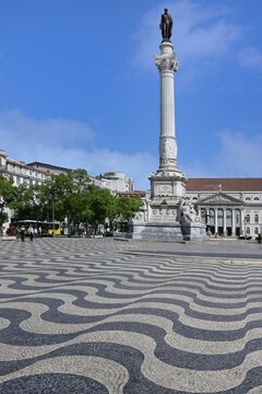 Rossio Square, Black and white waving cobblestones, Baixa, Lisbon, Portugal