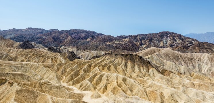 Panoramic view, Badlands, Zabriskie Point,  Panamint Range behind, Death Valley National Park, California, USA