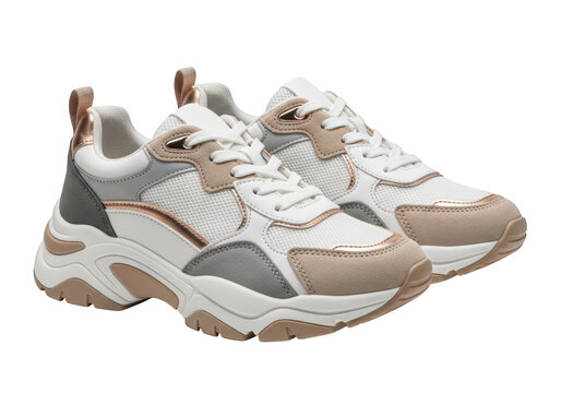 Stylish white chunky sneakers with rose gold and grey accents isolated on transparent background
