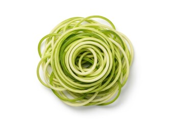 Fototapeta premium Delicate green rosette made from thinly sliced vegetable isolated on white background