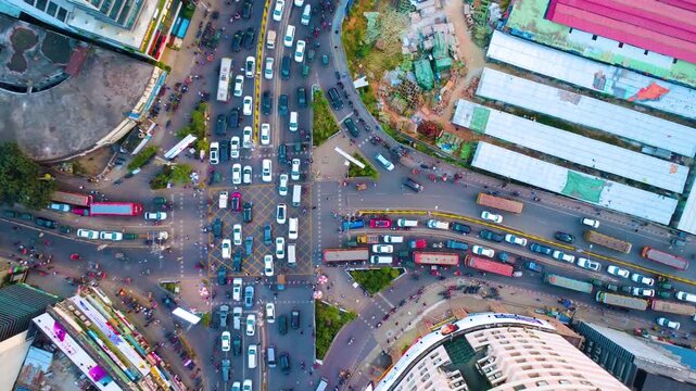 Aerial drone top video of Gulshan 1 circle Dhaka city traffic busy cityscape streets.