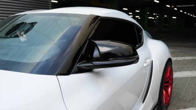 KYIV, UKRAINE - MAY 7, 2026: View of windshield and tuning stickers on sports car