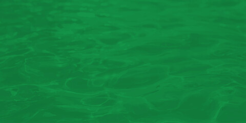 Abstract Emerald Green Water Surface with Soft Ripples and Caustic Light Refraction Texture for Nature Backgrounds © Jharna Akter