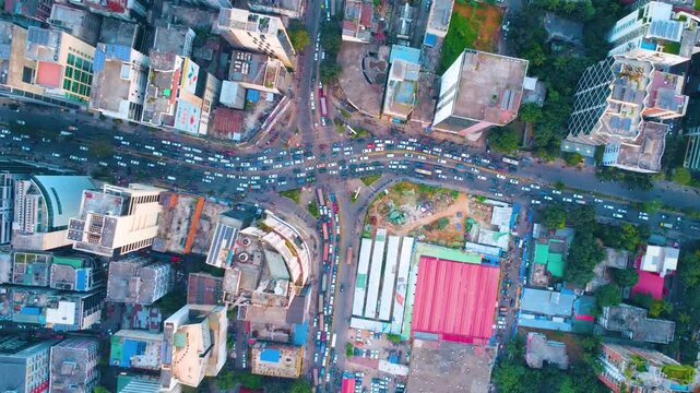 Aerial drone top video of Gulshan 1 circle Dhaka city traffic busy cityscape streets.