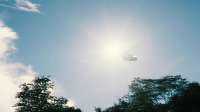 Helicopter flying slowly in the sky