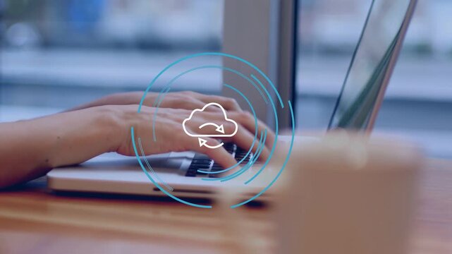 Cloud icon appearing, hands typing while laptop opening and rings rotating, syncing files