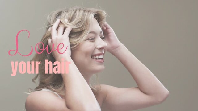 Woman raising hands to face, styling hair while pink script reading Love your hair for haircare