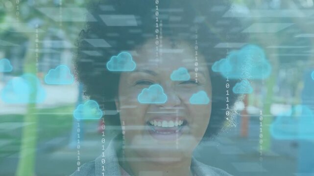 Woman smiling and turning in park, smile causing cloud tech and binary streams aligning over face