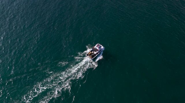 Footage of amateur fishermen fishing with their boats.