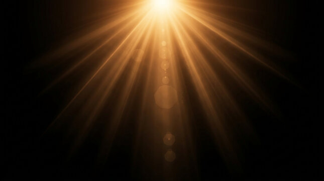 golden sunlight rays with lens flare effect over black background