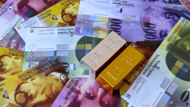 Gold and silver bullion or ingots as metals for bank storage, investments, and financial transactions. Gold and silver bars as a backdrop for your design