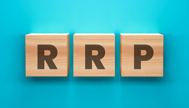 RRP Blocks Concept: Three wooden blocks, each displaying a bold letter of RRP, sit on a vibrant turquoise backdrop. This image embodies concepts of finance, pricing, or strategic planning.