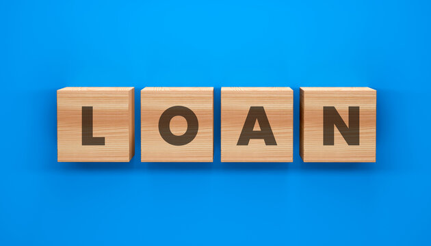 Loan in the Blue: A wooden block arrangement spells out LOAN against a vibrant blue backdrop, signifying financial transactions and lending services.