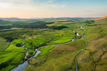 Naklejka premium Aerial sunset view over the Erriff River valley north of Killary Fjord, County Mayo, Ireland. Remote Wild Atlantic Way landscape near Leenane and Aasleagh Falls.