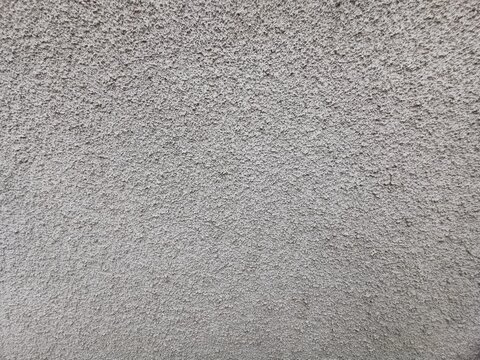 photographie en tr&egrave;s gros plan d'un mur recouvert de cr&eacute;pi pour texture en fond d'&eacute;cran