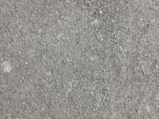 photographie en très gros plan d'un mur recouvert de crépi pour texture en fond d'écran © AURELIE SUARES