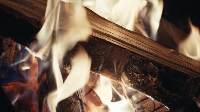 Closeup Burning Logs With Lively Flames, Outdoor Campfire Scene For Camping And Gathering, Sparks And Smoke Dance Over Charred Grain, Roast And Warmth