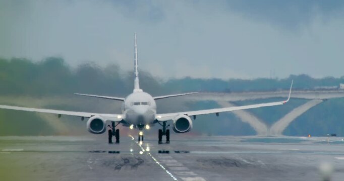 Jet Taking Off in the Rain in Slow Motion