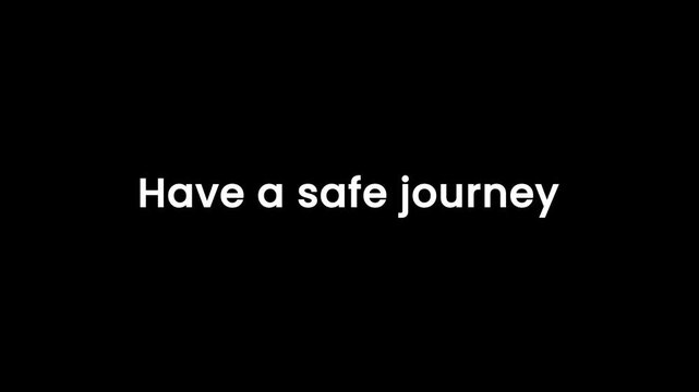 Closeup footage of safe journey message on dark background with handwritten text