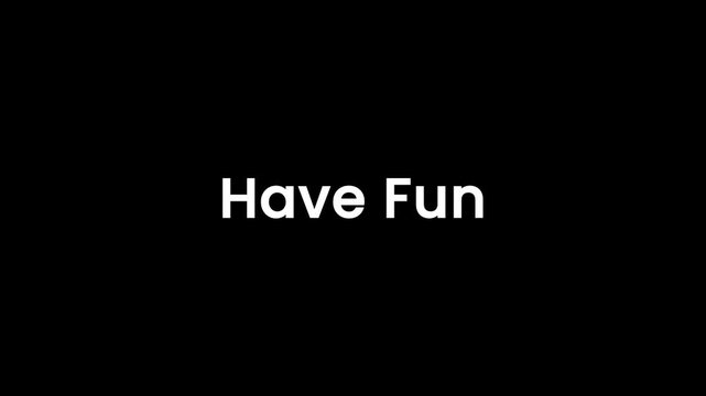 Closeup footage of neon sign displaying have fun message on black background