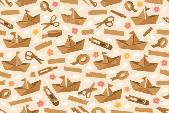 Craft paper boats and tools arranged on a light background with decorative elements and various craft supplies