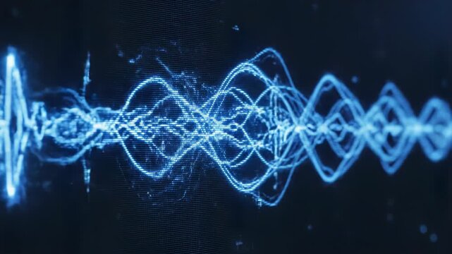 Close-up of a glowing blue digital waveform and audio signal displayed on a dark monitor screen, showing oscillating frequency peaks and troughs with pulse-like traces and visualized data