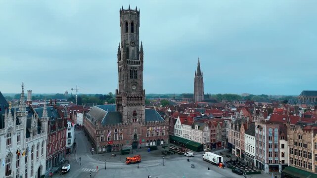 Aerial View of Bruges Grote Markt and Belfry Tower towards Church of Our Lady at Dawn
