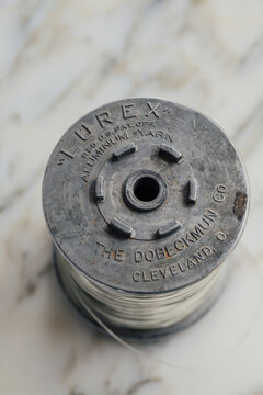 spool of Lurex vintage aluminum silver thread