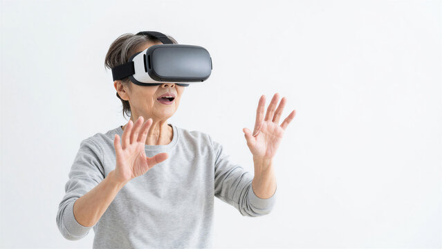 Senior Woman Experiencing Virtual Reality with Joy and Curiosity, Copy space on the left