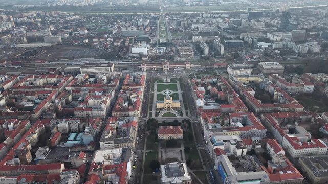 High-angle perspective of the Lenuci Horseshoe in Zagreb, featuring the Art Pavilion. Professional aerial photography of the city center and the main railway station during twilight.